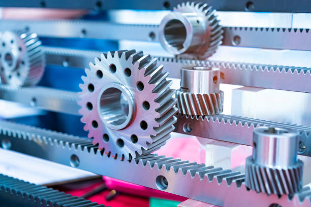 istock metal cog gears on blue background 2100693228