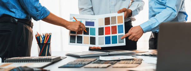 istock Group of professional interior designer and architect choosing color. Insight 2100695302