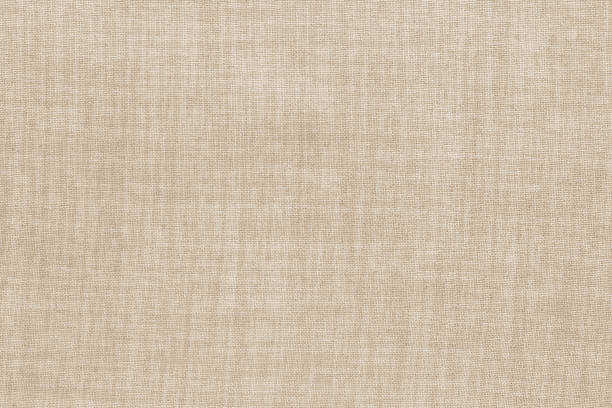 brown linen fabric texture background, seamless pattern of natural textile. - embroidery canvas beige close up - fotografias e filmes do acervo