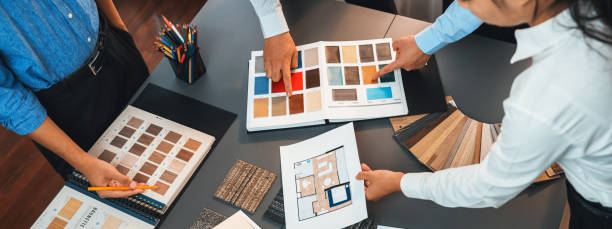 istock Group of professional interior designer and architect choosing color. Insight 2100734603