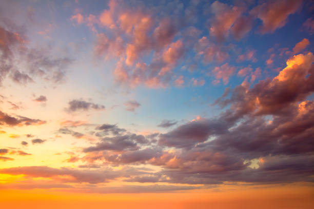 istock Majestic real sky - Vibrant  colors Panoramic Sunrise Sundown Sanset Sky with colorful clouds. Without any birds.  Natural Cloudscape 2100809232