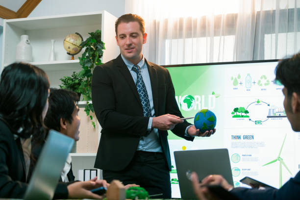 istock Businessman leader give presentation on eco-friendly implementation. Quaint 2100811832