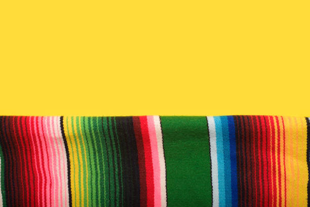 istock Serape on yellow background. Cinco de mayo background. 2100814328
