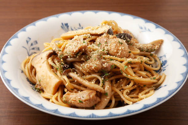 istock chicken and mushroom spaghetti 2100815206