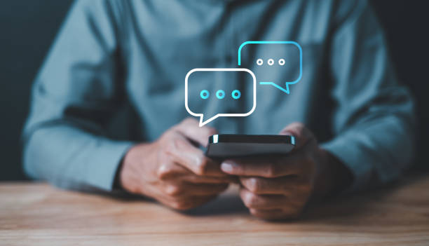 istock touching at smartphone for chatting and message. social network and communication used internet. 2100815576