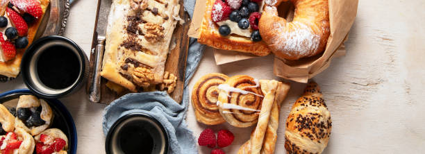 istock Freshly baked pastry. Delicious dessert table. 2100858801