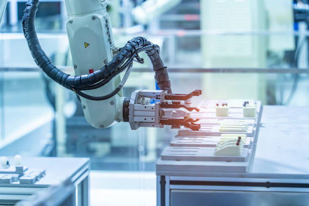 istock Automatic industrial robotic robot working, industry 4.0 and technology concept 2100941922