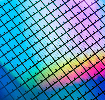 silicon wafer reflecting different colors.