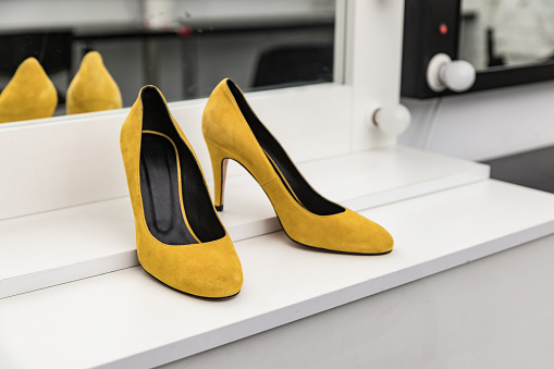 Women's elegant classic high-heeled shoes in yellow
