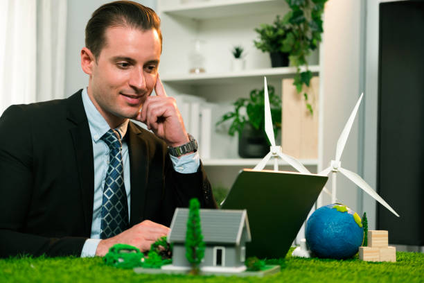 istock Businessman planning on his laptop with ECO strategy. Quaint 2100984457