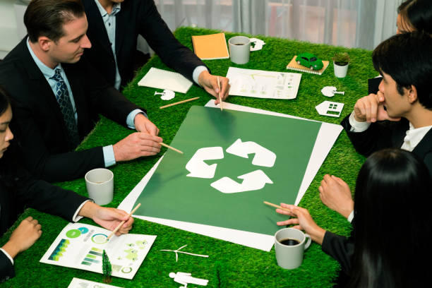 istock Recycle icon on meeting table with business people. Quaint 2101005225