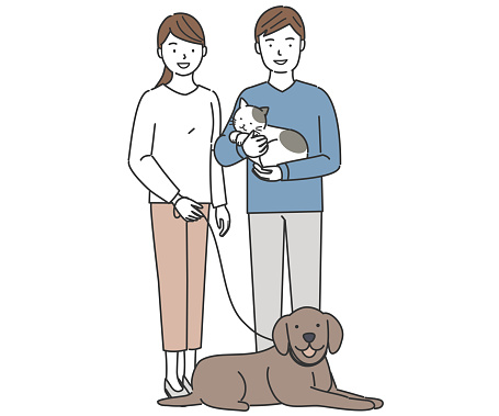 Young couple with dog and cat