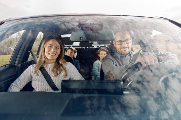 istock Happy family going on a vacation by car. 2101024924