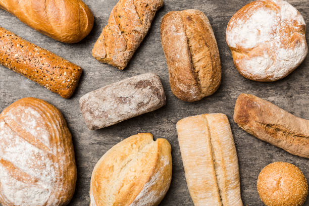 istock Homemade natural breads. Different kinds of fresh bread as background, top view with copy space 2101051483