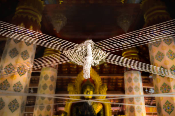 The art of arranging holy thread for use in Buddhist ritual of Thailand.
