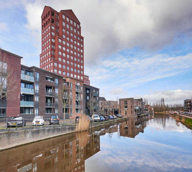 Houses above the canal in Vathorst, the suburbs of Amersfoort. stock photo