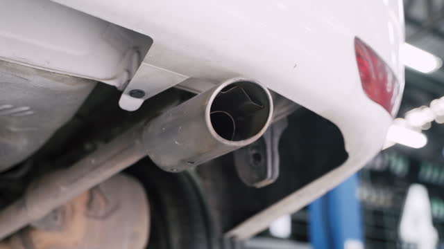 Closeup of exhaust pipe or muffler car with no pollution. Healthy concept.