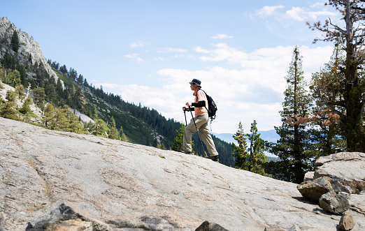 Man hiking Eagle Lake trail. Emerald Bay. South Lake Tahoe. California.