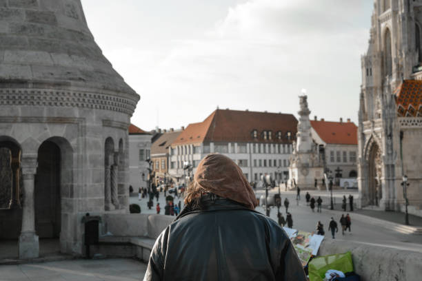 An old painter looking at Fisherman's Bastion. Budapest, Hungary