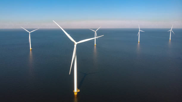 istock Windmill turbines in the Netherlands, green energy, eco friendly, energy transition 2101160949