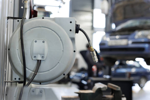 A coil for distributing compressed air and water in a car service station.