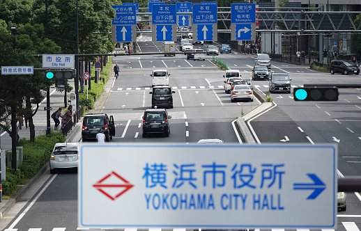 A road where cars run in front of Yokohama City Hall in Yokohama City, Japan