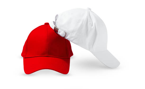 istock Red and White Baseball Caps on White Background 2101246178