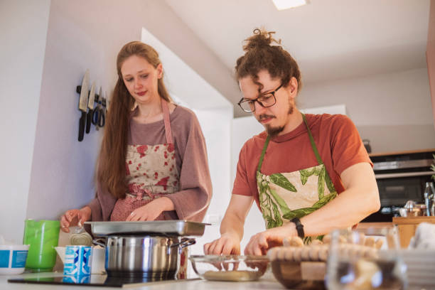 istock Best friends making Matcha tea Tiramisu at home 2101273154