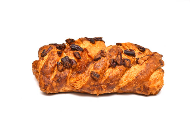 Delicious breakfast bun of Pecan Danish Pastry with raisins, honey and nuts