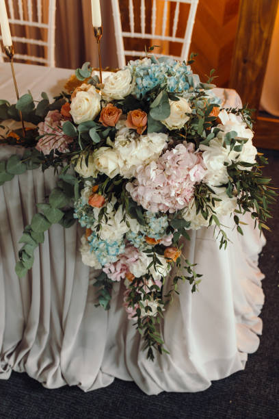 istock Exquisite, oversized floral centerpieces for wedding tables, evoking rustic charm and romance. 2101304538