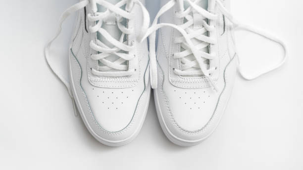 istock White sports shoe isolated on white background 2101322136