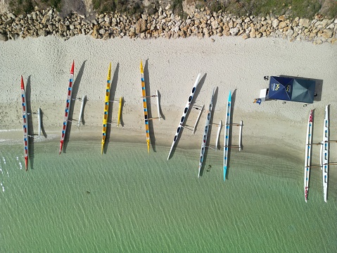 Busselton, Australia – March 09, 2024: Aerial view of outrigger canoes on West Busselton beach, Western Australia
