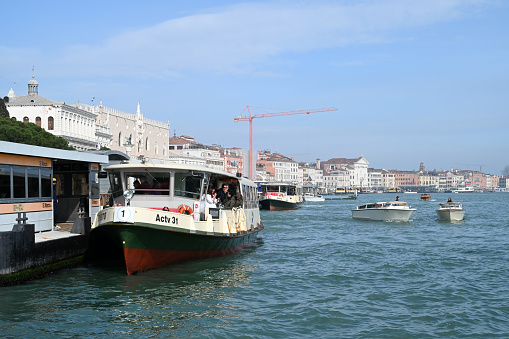 Venice, Italy, march 12, 2024 : Vaporetto loading passengers at San Marco station