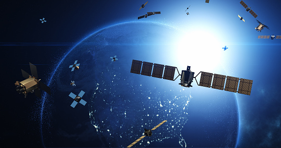 Advancing Telecommunication and High-Speed Internet. Satellites Flying Around Earth. Industry And Technology Related 3D Render.