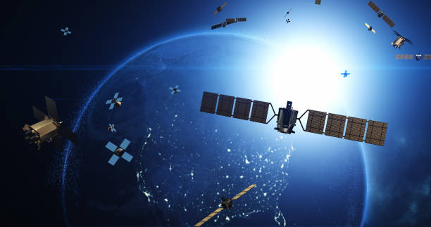 Advancing Telecommunication and High-Speed Internet. Satellites Around Earth Advancing Telecommunication and High-Speed Internet. Satellites Flying Around Earth. Industry And Technology Related 3D Render. broadband isp stock pictures, royalty-free photos & images