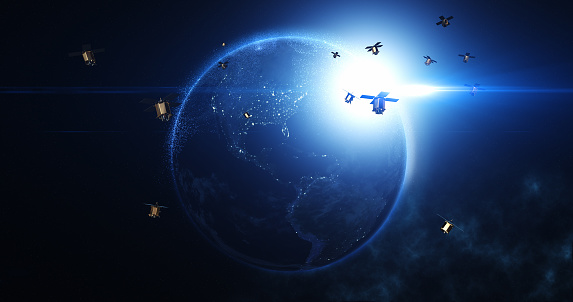 Satellites Flying Around Earth And Enabling High-Speed Internet and Telecommunication. Industry And Technology Related 3D Render.
