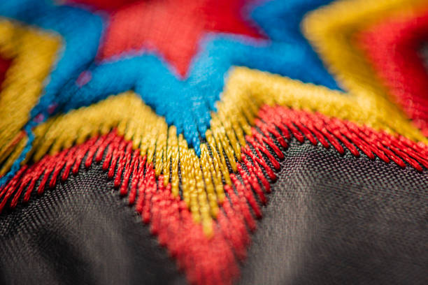 Texture of national Ukrainian patterns embroidered with an embroidery machine