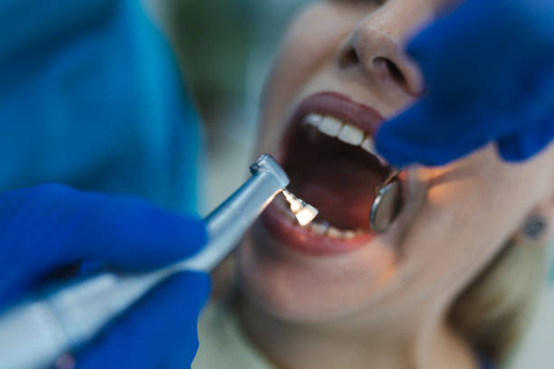 istock Dentist and patient in dentist office 2101438356