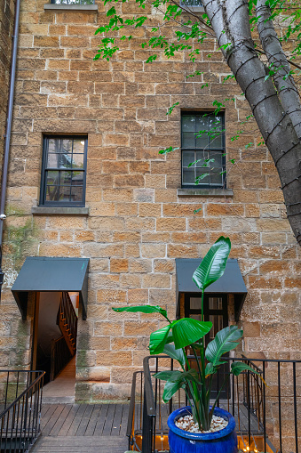 Sydney Rocks precinct on the shore of Sydney Harbour historical architecture from the first fleet settlement over 200 years ago. Buildings made from sandstone blocks small narrow streets NSW Australia