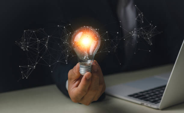 istock Creative thinking ideas and innovation technology,inspiration concept. Businessman holding a light bulb and imagination,Solution analysis and development network connection. 2101446815