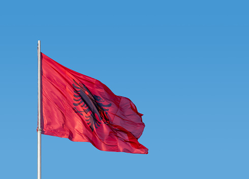 Large Albanian flag flies in Tirana