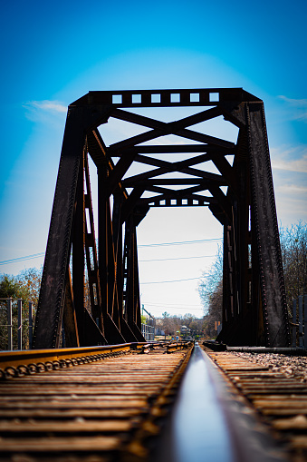 An old train bridge over a river