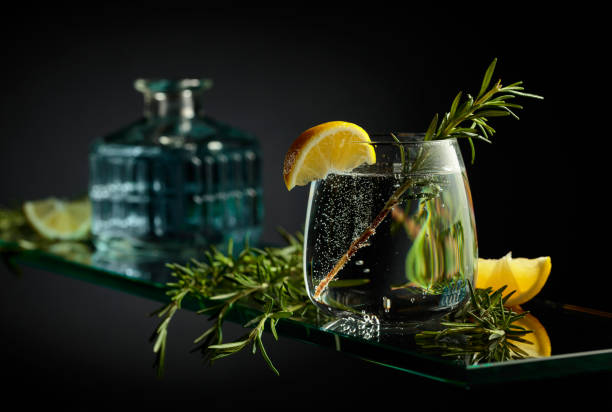 istock Gin tonic cocktail with lemon and rosemary. 2101483783