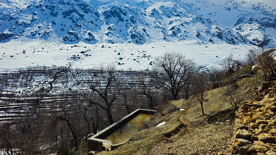 Huge camps of the pilgrims of Amarnath Yatra (pilgrimage), seen from the famous Zoji La mountain pass on the road between Ladakh (Leh) and Kashmir (Srinagar). The image shoes the end of the pass on the western side, close to the village of Sonamarg. The road is called Indian National Highway, crosses several high mountain passes, the most well known are Fatu La (4.100 m) and Zoji La (3.528 m altitude).