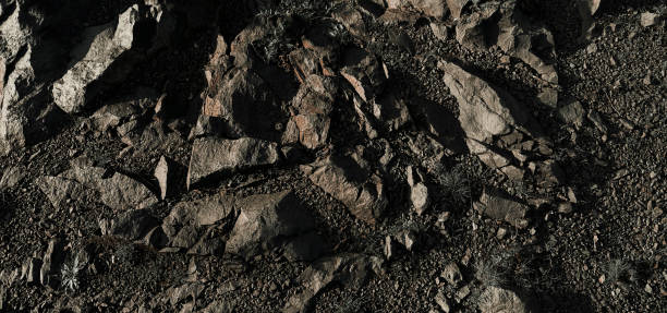 istock Stone background , Above is a full shot of a textured rough gray stony surface 2101529772