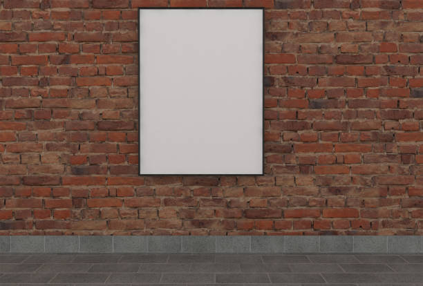 istock Mockup of an empty photo frame attached to a red brick wall. 2101535993