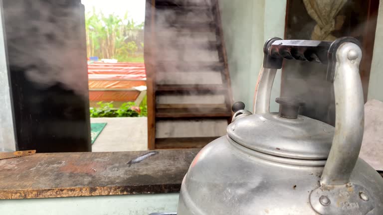 Boiling old steel silver kettle
