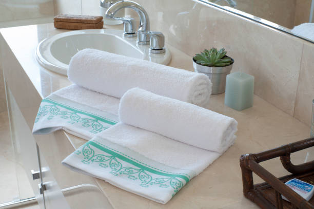 istock Beautiful bathroom with white towels 2101589937