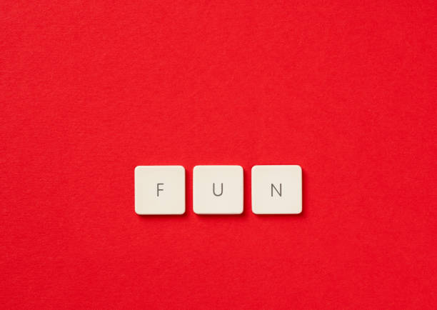 istock Close-up of computer button with symbol 'fun' on it, symbolizing enjoyment and entertainment. 2101607804