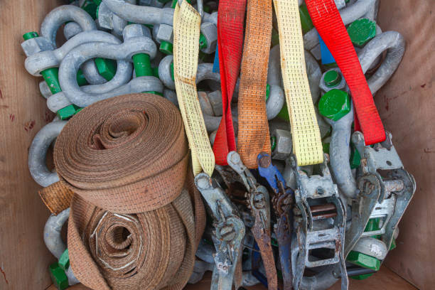 istock Fastenings for transporting goods. Straps, steel shackles and ratchet locks. 2101625721